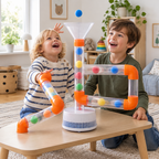 Kids playing with the air tube ball run in a playroom